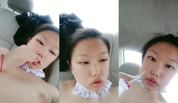 一瓶AD钙奶就上车的小骚逼，露脸与两个渣男玩3P车震，逼毛修的很漂亮，车上被两渣男抠穴换着草真可