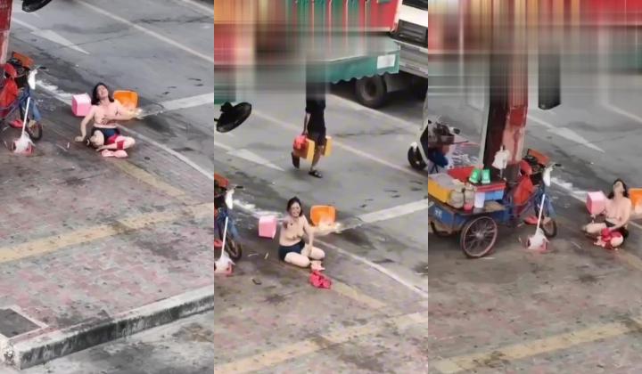 猎奇 熟女街头脱衣露出，然后躺在地上耍泼打滚，这是咋了？为情所困么