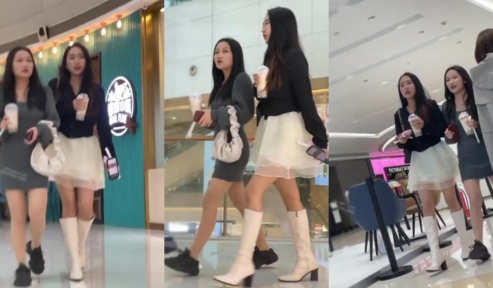 商城跟随偷窥两闺蜜 白裙白长靴美女 黑骚丁看着很性感