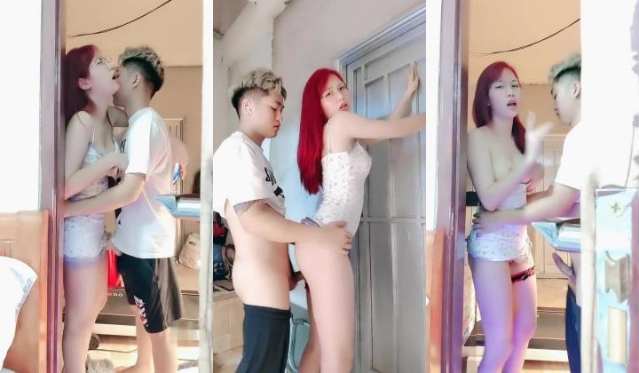 一头红发眼镜美女，抬起大长腿站立操，插的水声哗哗，边打电话边被操，美女太骚了