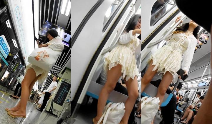 大神地铁尾随偷拍美女裙底风光 ️白色碎边仙女裙，美腿美脚黑骚丁