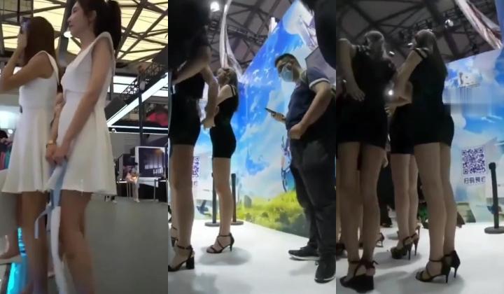 大神会展中心抄底偷拍几个白色短裙和性感包臀超短裙模特裙底风光有个妹子跟没穿内裤似的
