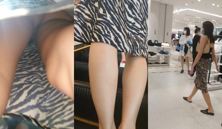 地铁站一路跟踪抄底长裙少妇 没穿内裤看到她的大黑B了