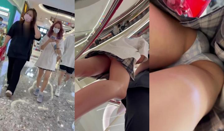 跟随抄底Jk美眉 蓝色花内内卡的屁屁好紧 看着好有弹性的大屁屁